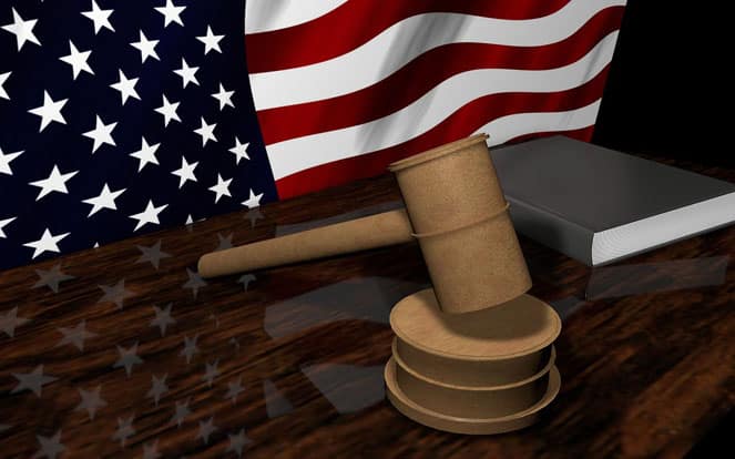 a flag of USA and a judicial gavel